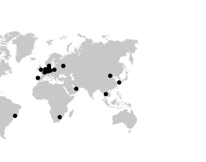Map in grayscale with black dots marking countries that hosted the conference. 