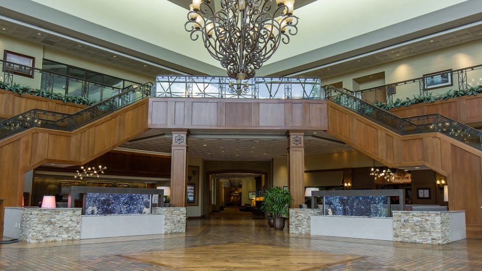 Stairs and counters in the Hilton Hotel lobby.