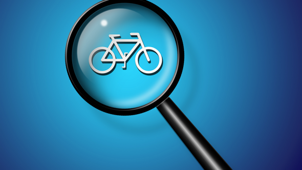 Förstoringsglas över symbol för cykel.